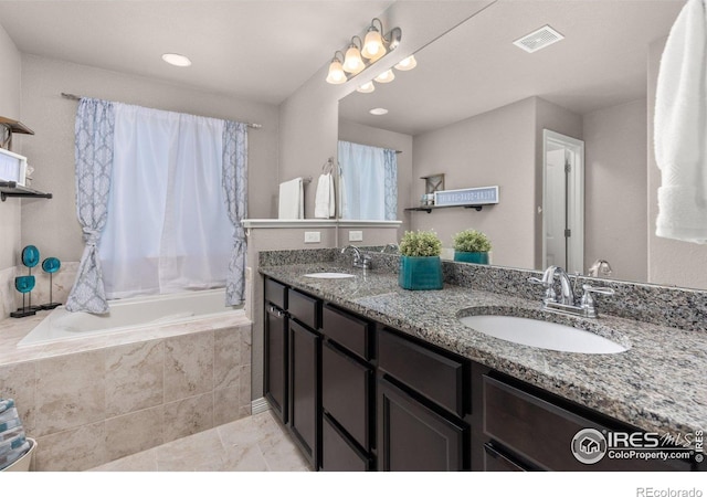 6681 6th St, Frederick, CO 80530 - full bathroom featuring double vanity and tiled bath