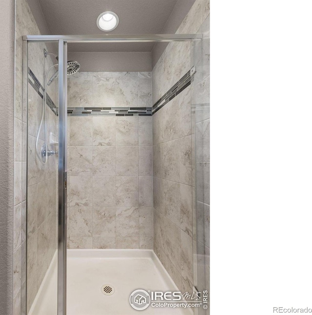 6681 6th St, Frederick, CO 80530 - full bathroom featuring a shower stall
