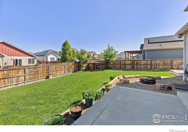 6681 6th St, Frederick, CO 80530 - view of yard with a fire pit, a residential view, and a patio area
