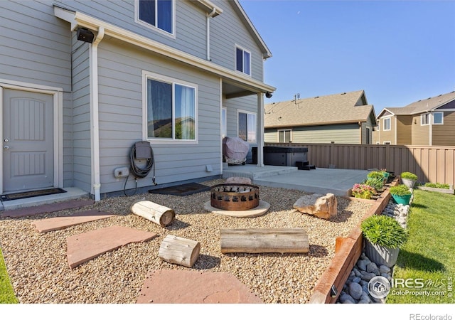6681 6th St, Frederick, CO 80530 - view of patio / terrace with a fire pit and a residential view