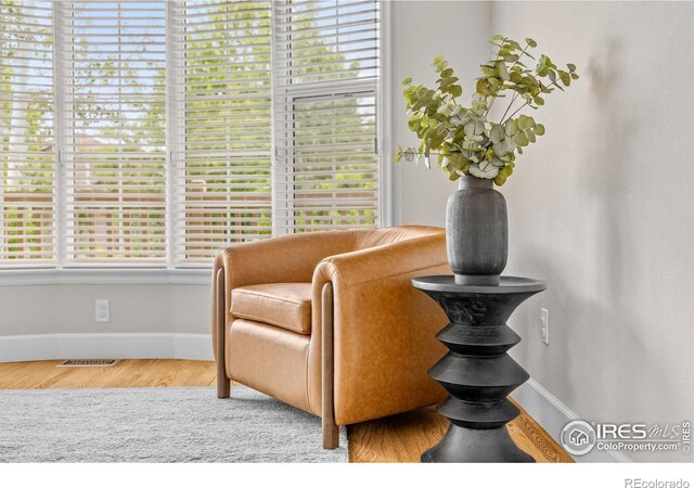 5348 Wild Dunes Ct, Boulder, CO 80301 - sitting room with baseboards and wood finished floors