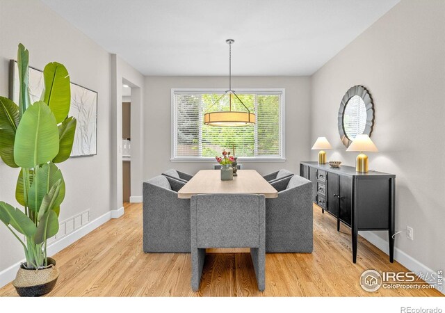 5348 Wild Dunes Ct, Boulder, CO 80301 - dining area with wood finished floors and baseboards