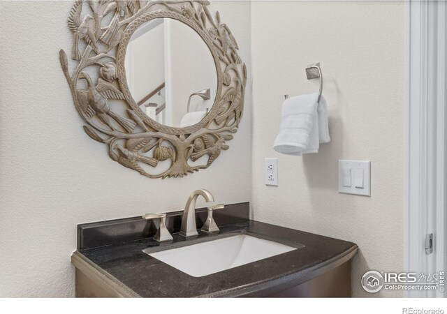 5348 Wild Dunes Ct, Boulder, CO 80301 - bathroom with a sink