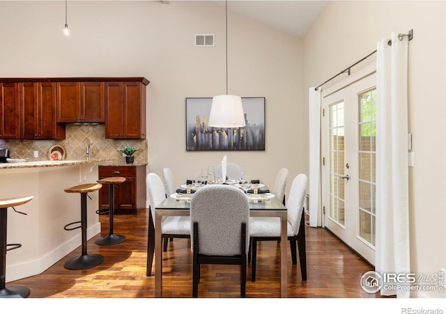 4924 Clubhouse Ct, Boulder, CO 80301 - dining area featuring high vaulted ceiling, dark wood-type flooring, and french doors