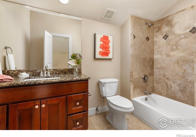 4924 Clubhouse Ct, Boulder, CO 80301 - bathroom with vanity, toilet, washtub / shower combination, tile patterned flooring, and baseboards