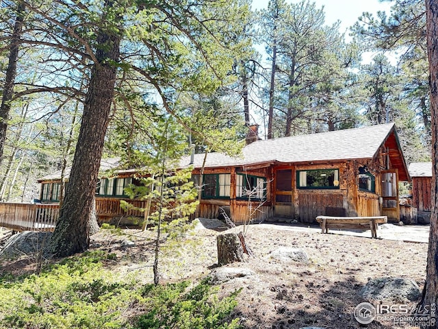 12991 Peak To Peak Hwy, Allenspark, CO 80510 - view of front of home featuring roof with shingles