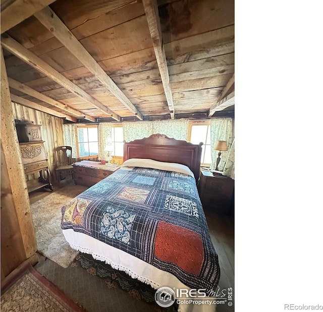 12991 Peak To Peak Hwy, Allenspark, CO 80510 - bedroom featuring wood ceiling with exposed beams