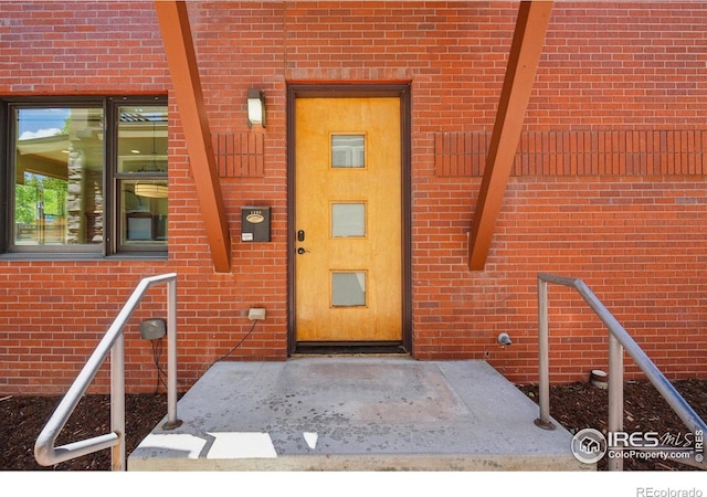 1203 High St, Boulder, CO 80304 - view of exterior entry featuring brick siding