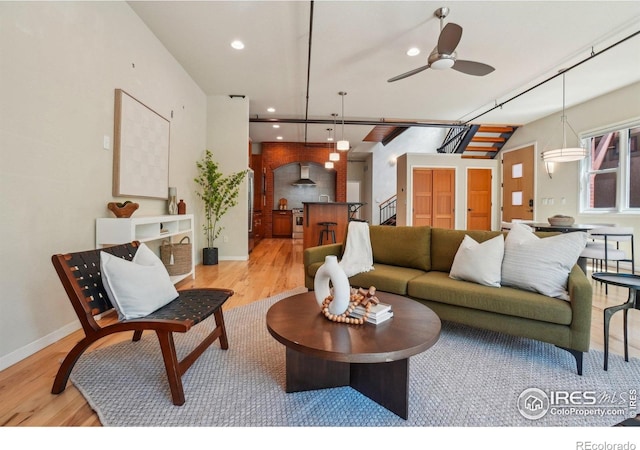 1203 High St, Boulder, CO 80304 - living room featuring light wood-style floors, ceiling fan, recessed lighting, stairs, and baseboards