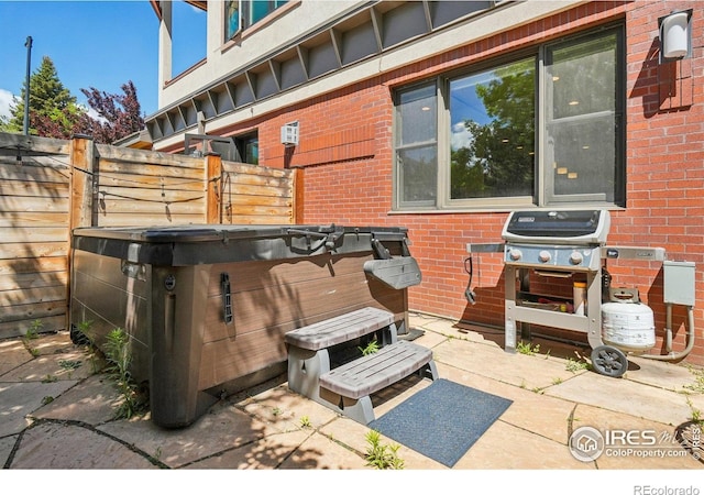 1203 High St, Boulder, CO 80304 - view of patio / terrace with a hot tub and grilling area