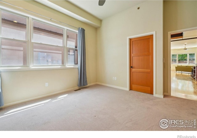 1203 High St, Boulder, CO 80304 - carpeted spare room featuring ceiling fan and baseboards