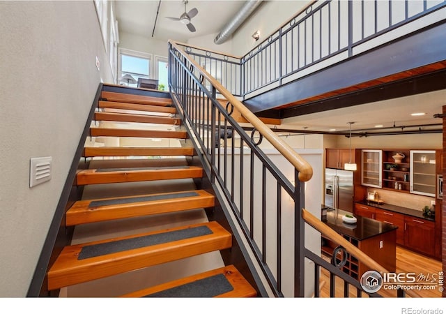 1203 High St, Boulder, CO 80304 - staircase featuring a high ceiling and a ceiling fan