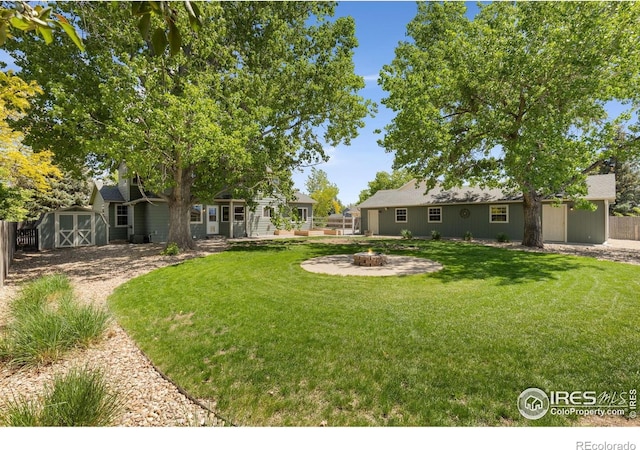 531 S 9th St, Berthoud, CO 80513 - view of yard featuring a fire pit