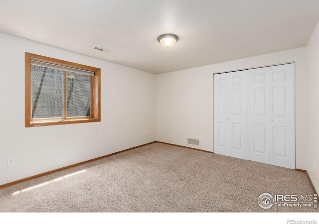 531 S 9th St, Berthoud, CO 80513 - unfurnished bedroom featuring carpet floors, baseboards, and a closet