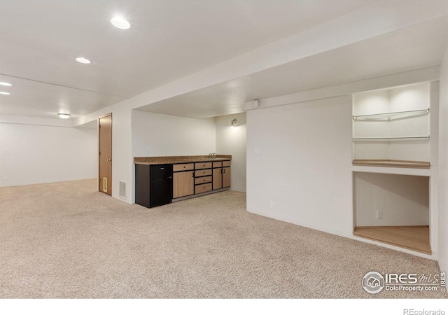 531 S 9th St, Berthoud, CO 80513 - finished basement with carpet flooring and recessed lighting