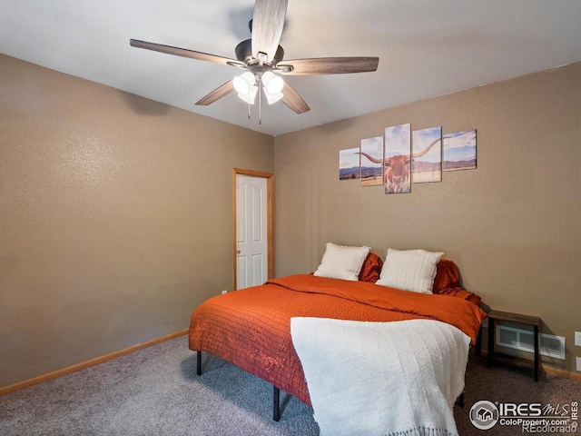 101 SE 2nd St, Berthoud, CO 80513 - bedroom with carpet flooring, baseboards, and a ceiling fan