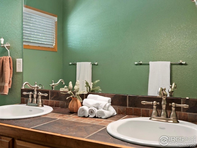 101 SE 2nd St, Berthoud, CO 80513 - bathroom with double vanity and a textured wall