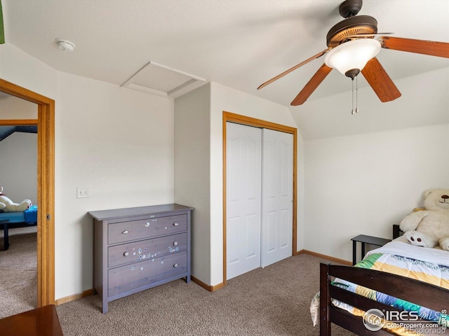 101 SE 2nd St, Berthoud, CO 80513 - bedroom with light carpet, attic access, vaulted ceiling, a closet, and ceiling fan
