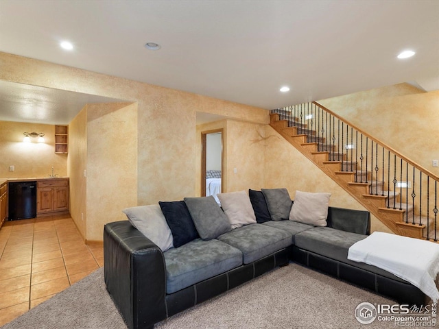 101 SE 2nd St, Berthoud, CO 80513 - living area with recessed lighting, stairway, bar with sink, and light tile patterned flooring