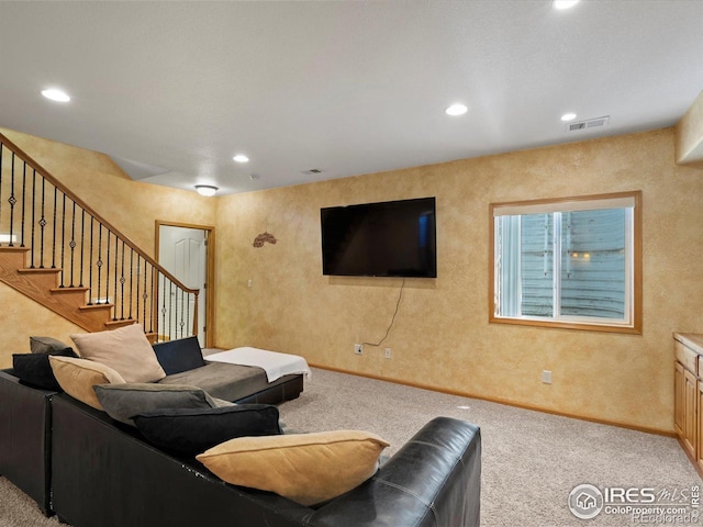 101 SE 2nd St, Berthoud, CO 80513 - carpeted living room featuring recessed lighting, stairway, and baseboards