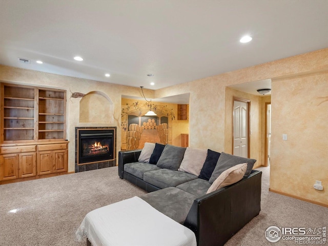 101 SE 2nd St, Berthoud, CO 80513 - carpeted living area featuring recessed lighting and a tiled fireplace