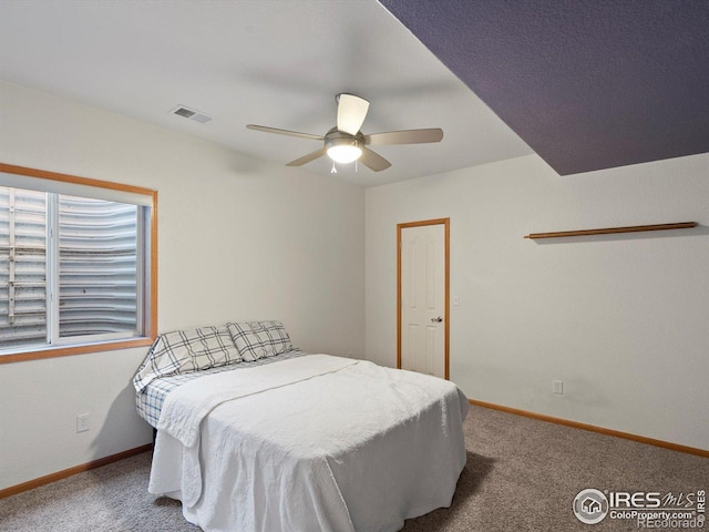 101 SE 2nd St, Berthoud, CO 80513 - carpeted bedroom featuring baseboards and a ceiling fan