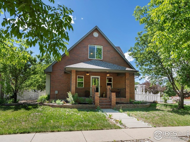 101 SE 2nd St, Berthoud, CO 80513 - bungalow with covered porch and brick siding