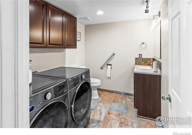 3255 Thundering Herd Way, Wellington, CO 80549 - laundry area with washing machine and clothes dryer and baseboards