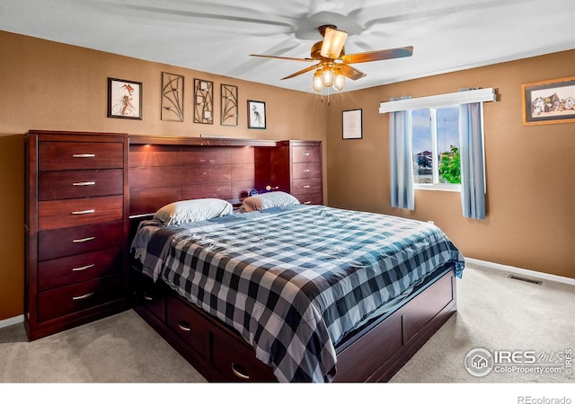 3255 Thundering Herd Way, Wellington, CO 80549 - carpeted bedroom with baseboards and a ceiling fan