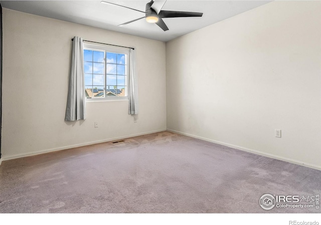 3255 Thundering Herd Way, Wellington, CO 80549 - carpeted spare room with a ceiling fan and baseboards