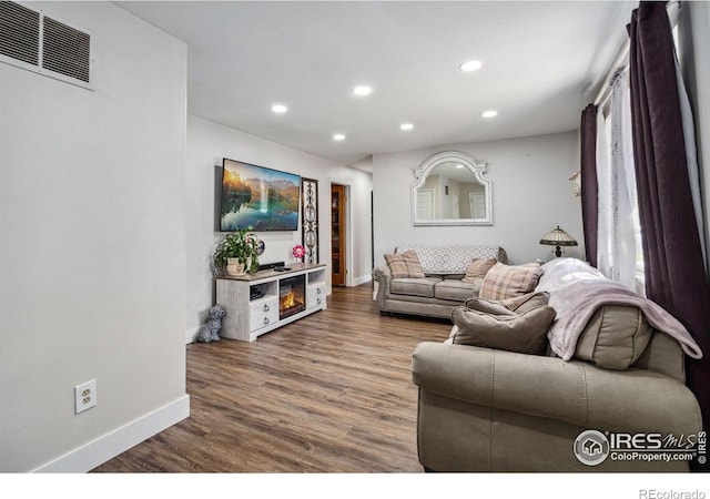 3409 Post Rd, Laporte, CO 80535 - living area featuring recessed lighting, baseboards, and wood finished floors