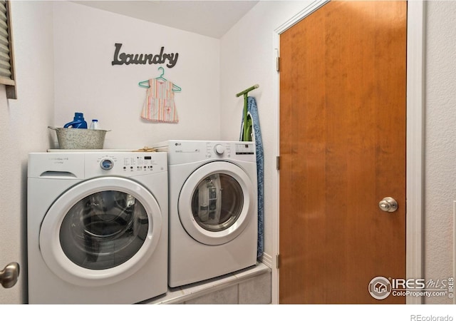 201 Timber Ridge Ct, Severance, CO 80550 - washroom with washing machine and dryer