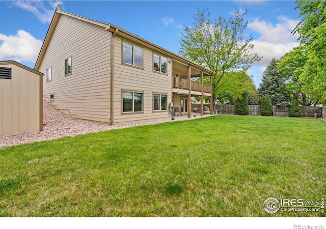 201 Timber Ridge Ct, Severance, CO 80550 - rear view of house featuring a patio area and a balcony