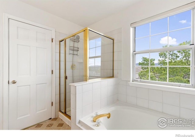2982 W Long Dr # C, Littleton, CO 80120 - bathroom featuring a shower stall and a bath