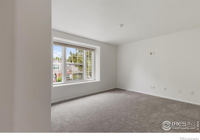 2982 W Long Dr # C, Littleton, CO 80120 - carpeted empty room featuring baseboards