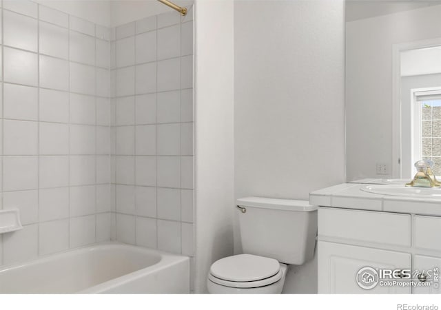 2982 W Long Dr # C, Littleton, CO 80120 - bathroom featuring toilet, vanity, and shower / washtub combination