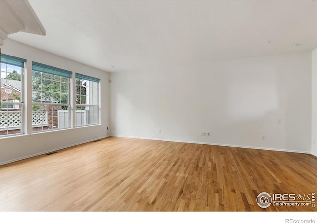 2982 W Long Dr # C, Littleton, CO 80120 - empty room with light wood-style flooring and baseboards