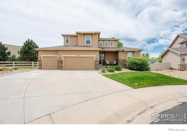 7401 Pimlico Dr, Windsor, CO 80550 - prairie-style home with stone siding and driveway