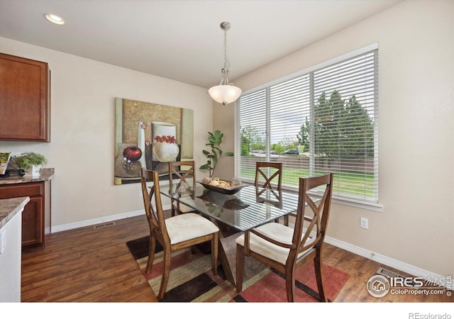 7401 Pimlico Dr, Windsor, CO 80550 - dining space with dark wood-type flooring, baseboards, and recessed lighting