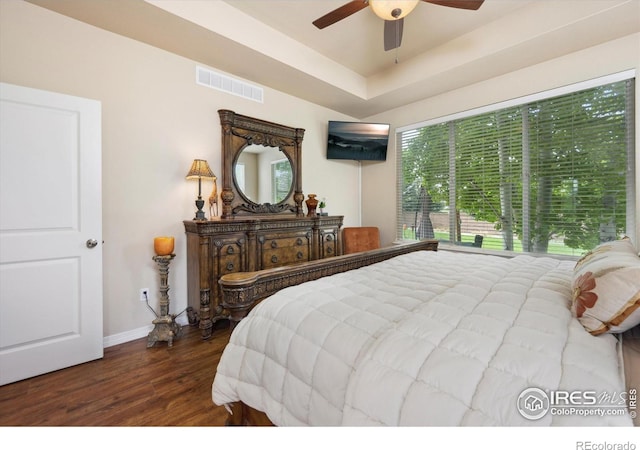 7401 Pimlico Dr, Windsor, CO 80550 - bedroom with wood finished floors, baseboards, and a ceiling fan