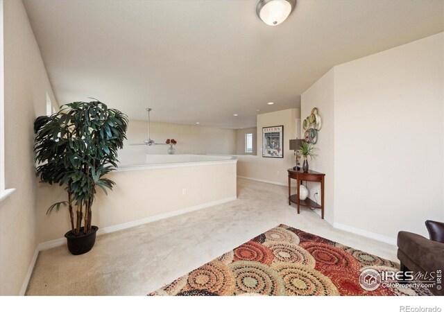 7401 Pimlico Dr, Windsor, CO 80550 - bathroom featuring a garden tub and baseboards