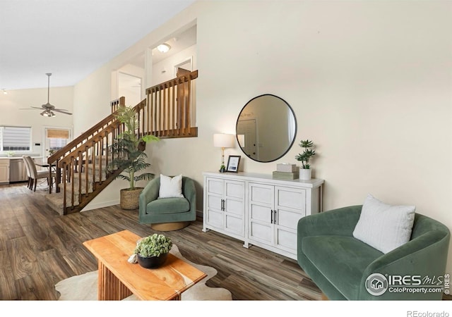 1512 Calkins Ave, Longmont, CO 80501 - living room featuring stairs, wood finished floors, ceiling fan, and a towering ceiling