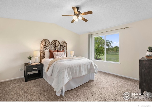 1512 Calkins Ave, Longmont, CO 80501 - bedroom featuring carpet, vaulted ceiling, baseboards, a textured ceiling, and a ceiling fan