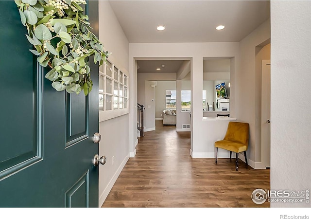6398 Verna Ct, Timnath, CO 80547 - foyer with wood finished floors, recessed lighting, and baseboards