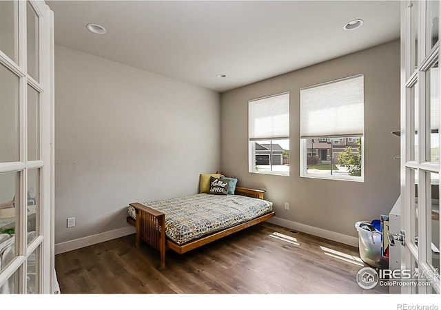 6398 Verna Ct, Timnath, CO 80547 - bedroom featuring baseboards, wood finished floors, and recessed lighting
