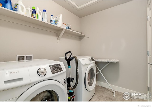 6398 Verna Ct, Timnath, CO 80547 - laundry room featuring separate washer and dryer, baseboards, and light tile patterned floors