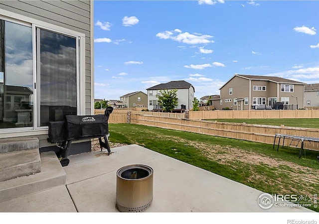 6398 Verna Ct, Timnath, CO 80547 - view of patio / terrace with a residential view and a trampoline