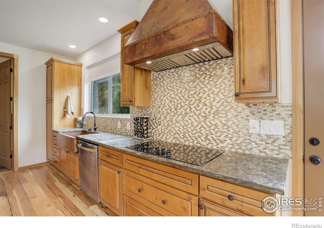 178 Cree Ct, Lyons, CO 80540 - kitchen with premium range hood, black electric stovetop, dishwasher, a sink, and light wood-type flooring