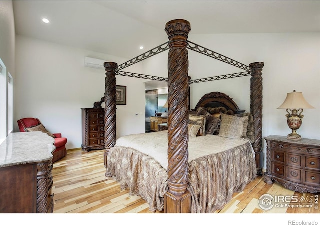 178 Cree Ct, Lyons, CO 80540 - bedroom with light wood-type flooring, recessed lighting, and an AC wall unit
