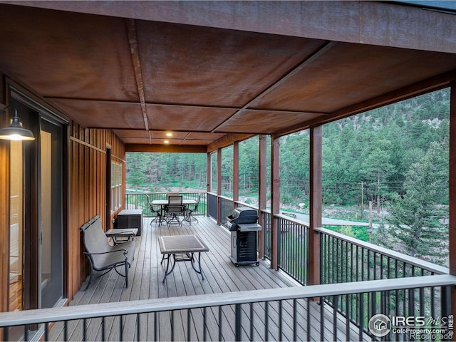 178 Cree Ct, Lyons, CO 80540 - wooden terrace featuring a grill and outdoor dining area